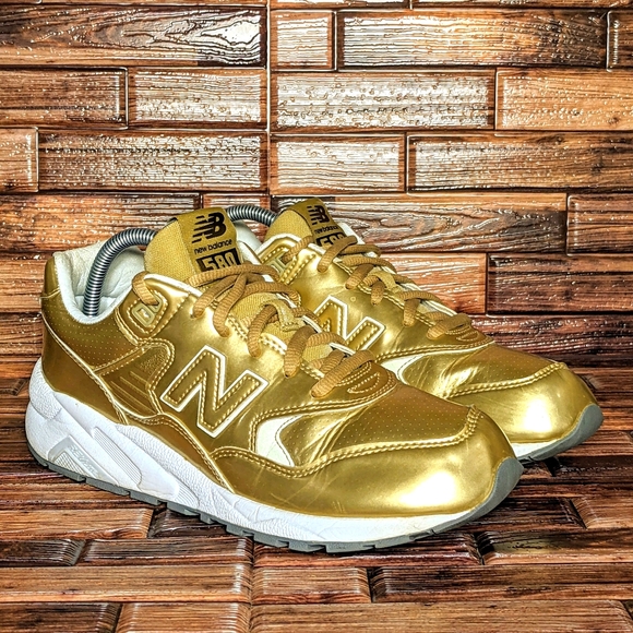 new balance boots gold
